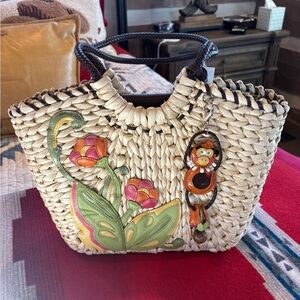 Brighton Cream Floral Straw Tote with Monkey Charm
